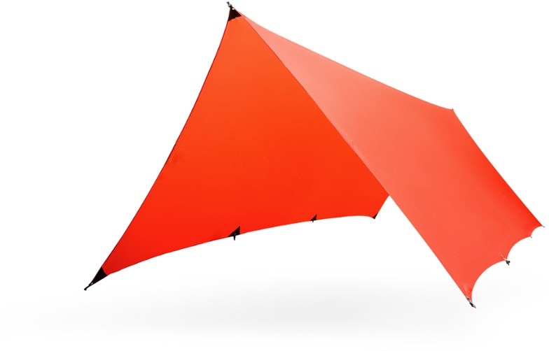 Angled side view of tarp pitched over hammock setup using trekking poles – best outdoor shelter for camping