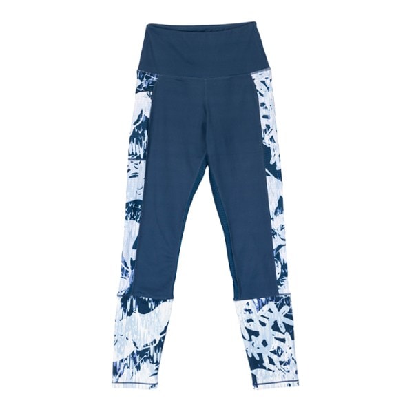 Close-up of waistband on women's thermal leggings showing high-rise fit and soft fleece texture