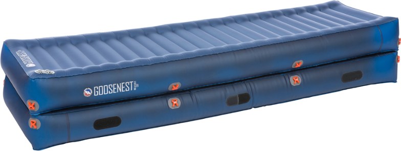 Side view of the Big Agnes Goosenest Double-Decker cot set up in a campsite, showcasing its elevated design.