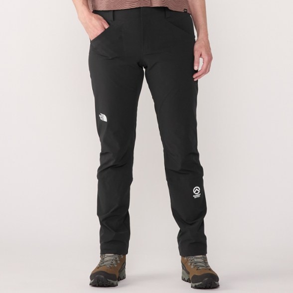 Side view of women's Summit Series hiking pants showcasing the slim fit and articulated knees.