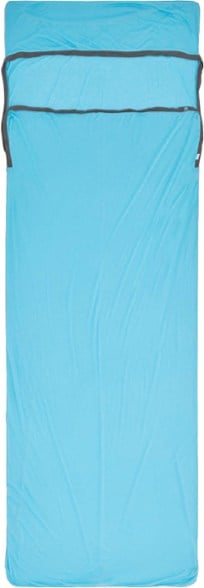 Eco Breeze sleeping bag liner displayed outdoors showcasing its pillow sleeve and moisture-wicking fabric.