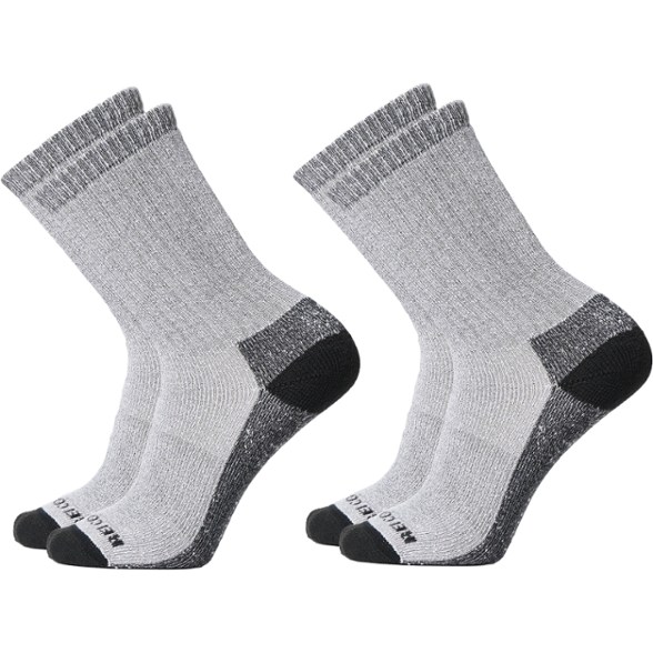 Eco-friendly midweight hiking socks displayed outdoors, highlighting their breathable fabric.