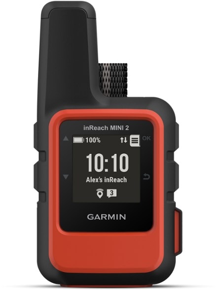 Garmin inReach Mini 2 satellite communicator on a hiking trail.