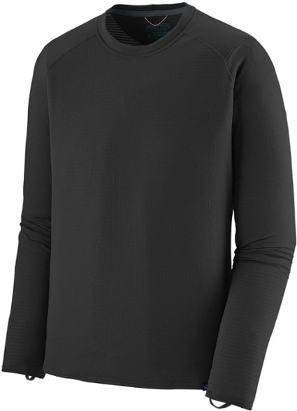 Men's Capilene Thermal Weight Crew Top showcasing warmth and flexibility on a ski slope.