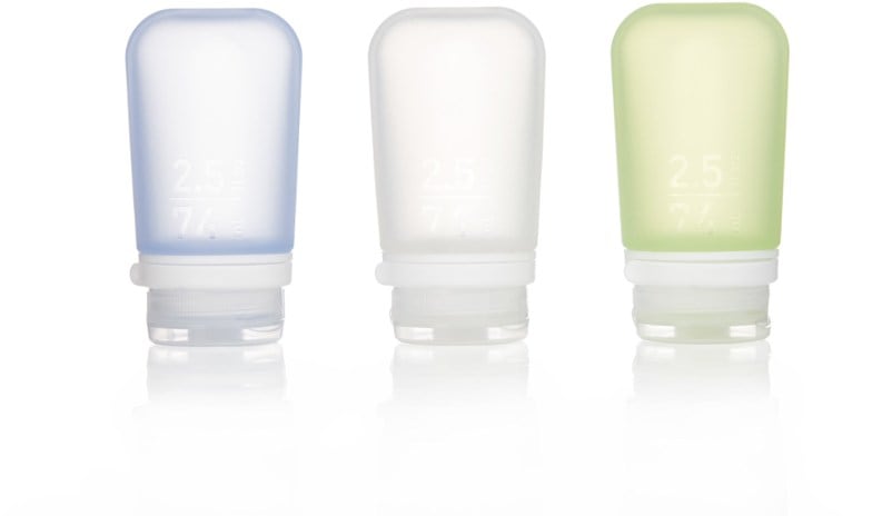 GoToob+ medium squeeze bottles in a travel setup, highlighting portability and utility.