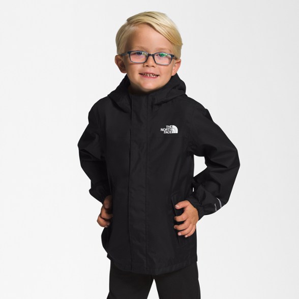 North Face Kids' Waterproof Rain Jacket on a child playing in the rain