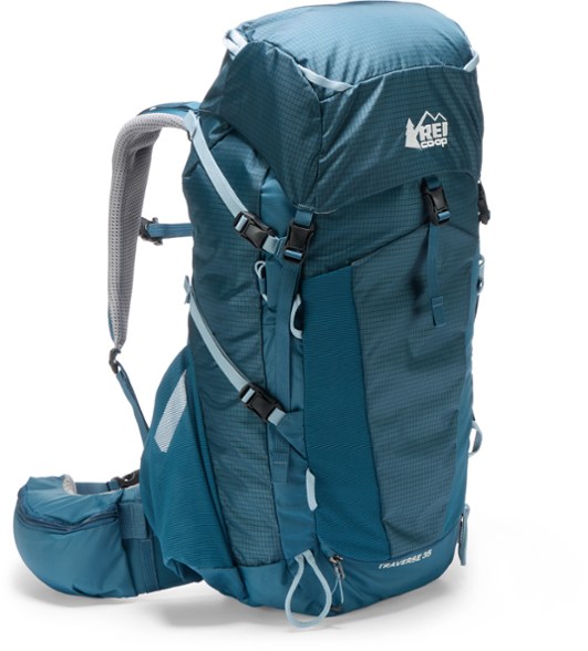 Front view of the Traverse 35 Women's Hiking Backpack showcasing its spacious main compartment and external pockets.