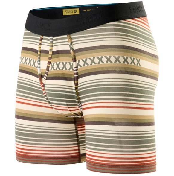 Stance Curren boxer briefs displayed on a wooden table, emphasizing their premium fabric and sleek design.