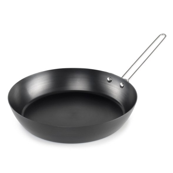 Top view of the durable carbon steel frypan with a sturdy handle, ideal for camping.
