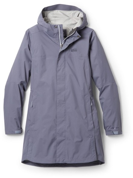 Rainier Women's Long-Line Jacket in action during a hike, showcasing its waterproof features.