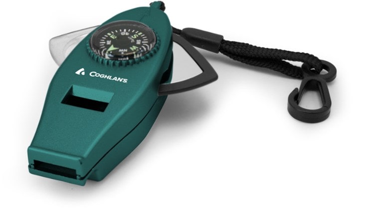Close-up of the versatile survival whistle showing LED light and compass features.