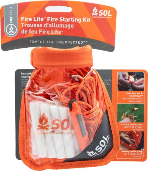 Close-up of the waterproof dry bag containing the fire starter kit essentials.