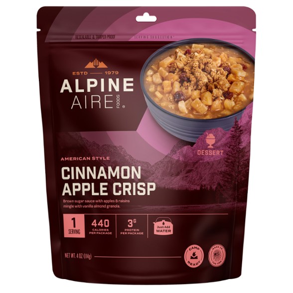 Instant apple crisp dessert displayed outdoors, perfect for camping trips.