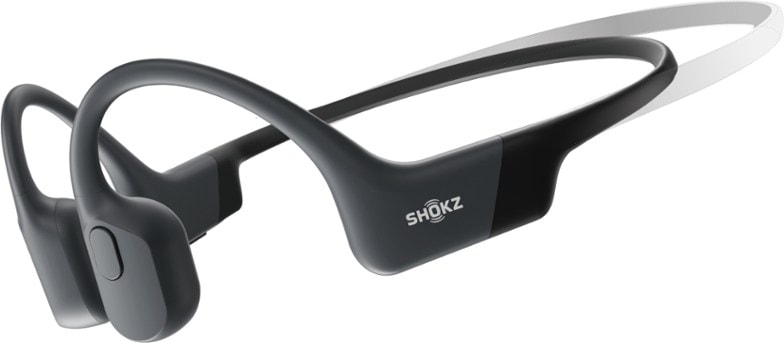 Close-up of Shokz Mini Pro Open-Ear Headphones highlighting the angled transducers and lightweight build.