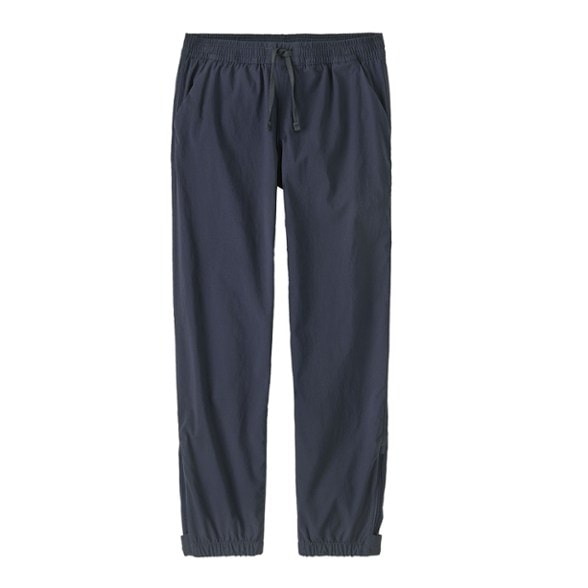 Patagonia Kids' Trailblazer Pants displayed in a sunny park, showcasing their sun-protective features.