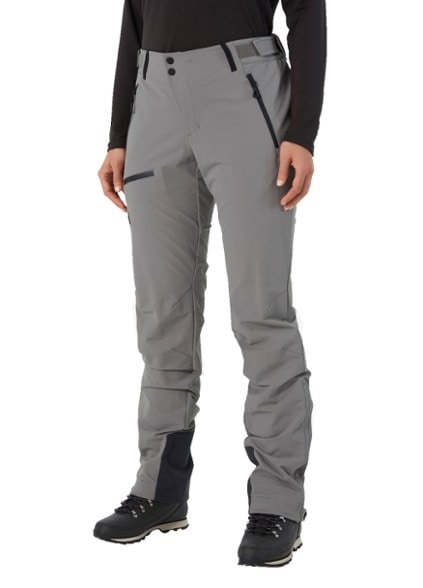 Front view of women's outdoor pants showing durable water-resistant soft-shell fabric and adjustable waist
