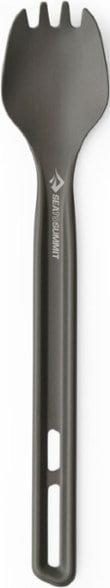 SummitLite Long Handle Spork resting on a camping table, highlighting its sleek design.