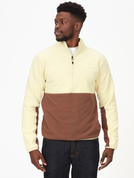 Men's Half-Zip Fleece Pullover in a camping setting, showcasing its flexibility and warmth.
