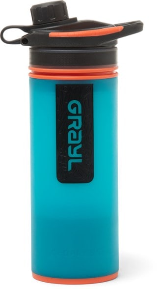 GeoPress Travel Purifier Bottle filtering water in nature.