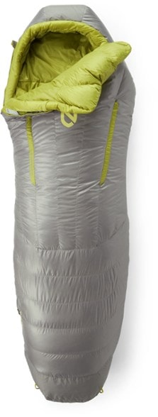 NEMO Riff 15 down sleeping bag in a scenic campsite setting, showcasing its lightweight design.