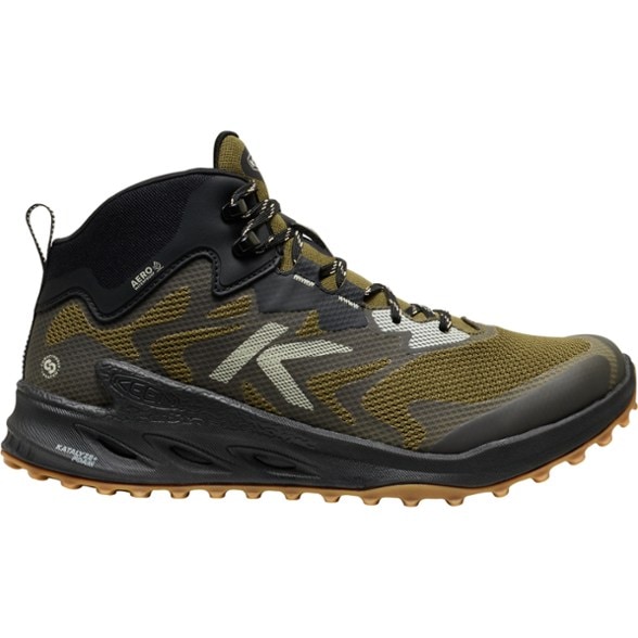 Side view of Zionic NXT Men's Waterproof Hiking Boots on rocky trail.