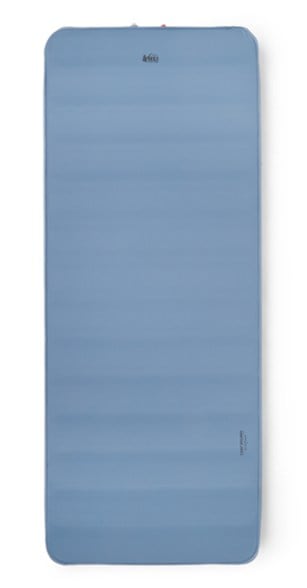 Dreamer XL self-inflating camping mattress in a serene outdoor setting