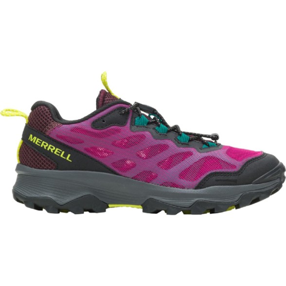 Side view of women's hiking shoes with quick lace system and breathable mesh uppers on rocky trail