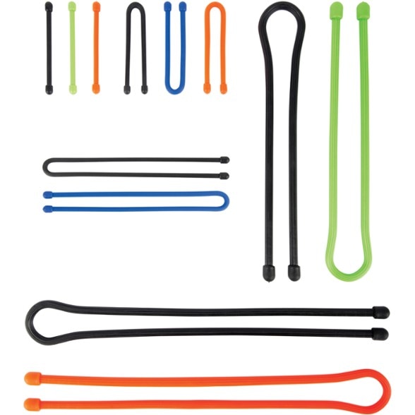 Colorful gear ties in assorted sizes arranged on a wooden surface