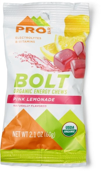 Close-up of PROBAR Bolt™ organic energy chews in Raspberry flavor, showcasing packaging and chews.