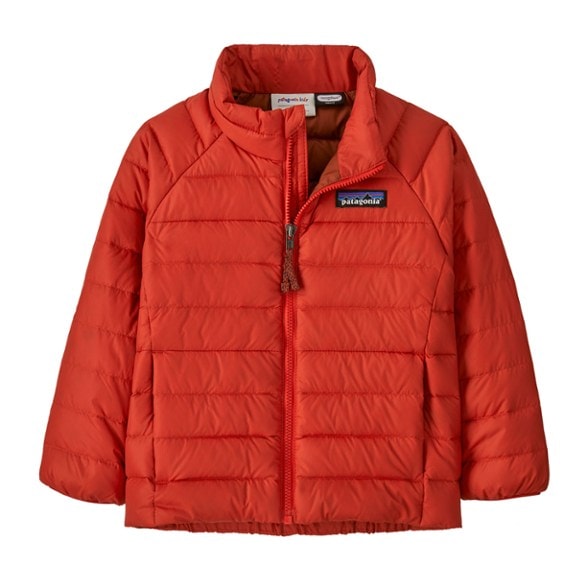 Front view of infant wearing EcoSoft Puffdown Jacket outdoors on snowy terrain