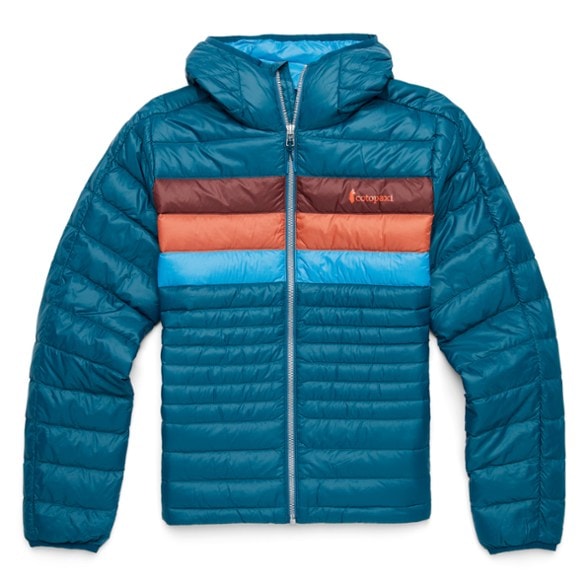 Fuego Women's 800 Fill Power Down Jacket in a mountain setting, highlighting its warmth and water-resistant features.