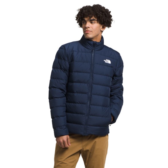 North Face Aconcagua 3 jacket worn during a winter hike, showcasing its warmth and style.
