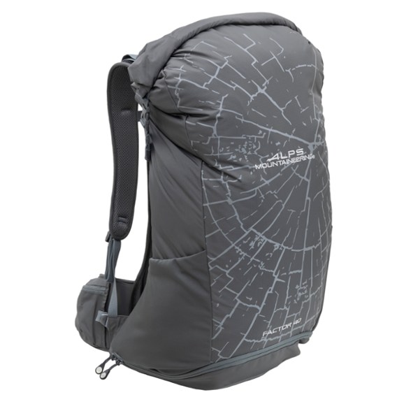 Side view of Factor 40 lightweight backpack showing roll-top opening and stretch side pockets