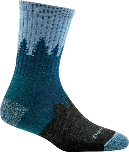 Elevate Merino Wool Crew Socks for Women in hiking boots, showcasing comfort and fit.