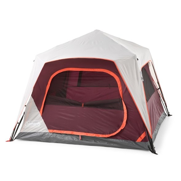 Skylodge Instant Camping Tent set up in a forest, showcasing spacious interior.