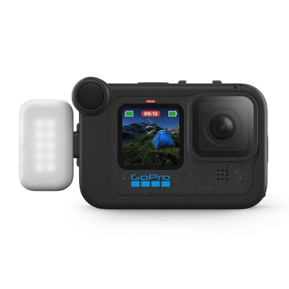 Adventure Light Mod attached to a GoPro, showcasing its compact design and brightness settings.