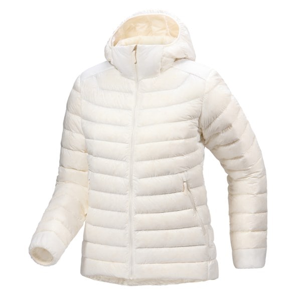 Cerium Women's Packable Down Hoodie showcasing its lightweight design while hiking.