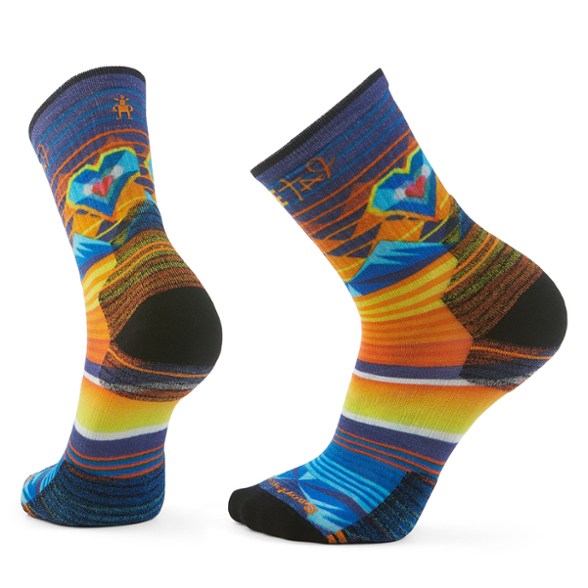 Close-up of Trailblazer Merino Wool Crew Socks showcasing the Open Hearts print.