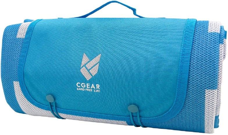 CGear sand-free outdoor blanket spread out at the beach, showcasing its sand-free technology.