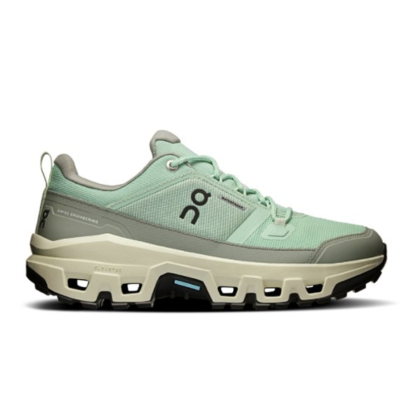 Side view of Cloudrock women's waterproof hiking shoes on rocky terrain.