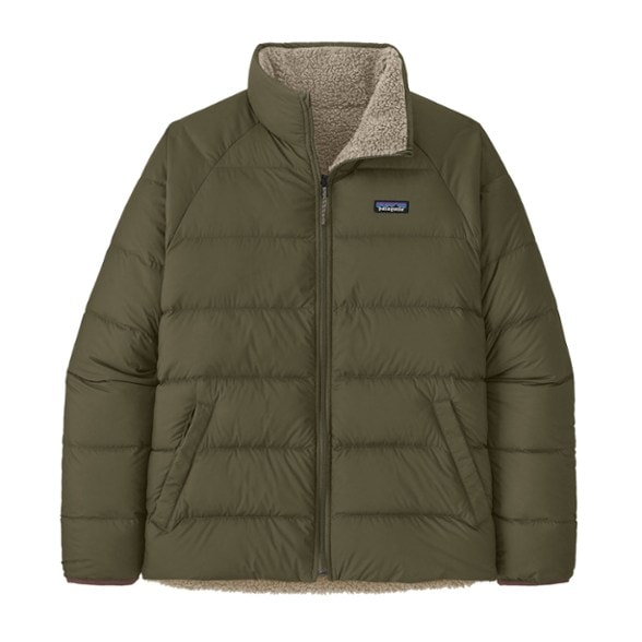 Men's reversible down jacket showing the fleece side in a winter setting.