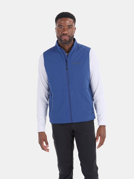 Close-up of the Marmot Novus LT vest's zipper and pocket details, highlighting its functionality.