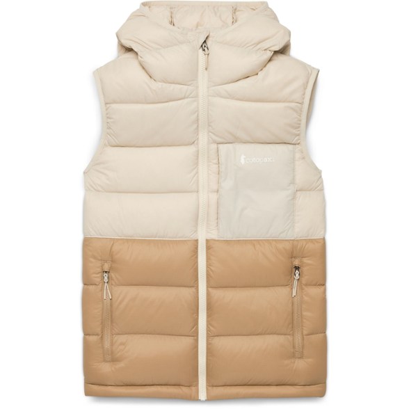 Fuego Max Women's Packable Down Vest on a snowy trail, showcasing its warmth and stylish look.
