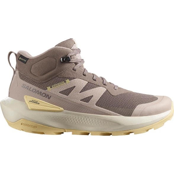 Side view of women's Salomon Elixir Activ Mid GORE-TEX hiking boots, highlighting the waterproof design and sturdy construction.