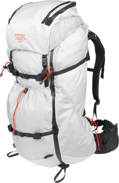 Radix 57 Women's Backpacking Pack in a scenic mountain setting, highlighting its ergonomic fit and sturdy construction.