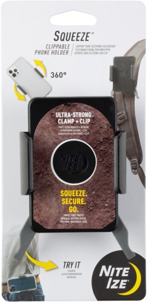 AdventureClip phone holder attached to a backpack during a hike, demonstrating hands-free convenience.