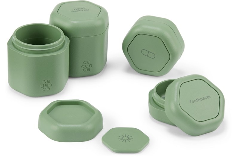 Eco-friendly travel essentials set showcasing labeled capsules from the front.