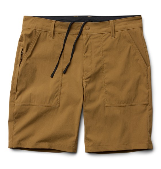 Men wearing Traxion Adventure Shorts while hiking on a mountain trail.