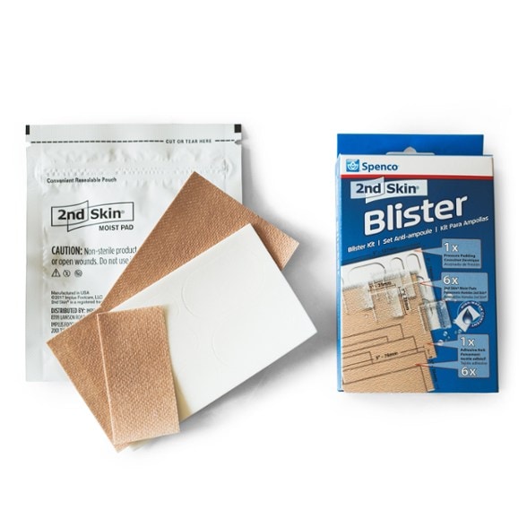 Close-up of TrailGuard 2nd Skin blister pads protecting heel during hiking