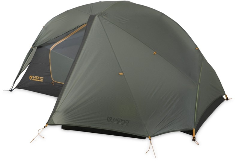 Dragonfly OSMO 2P tent set up in a scenic bikepacking location, showcasing its sleek design and stealth colors.